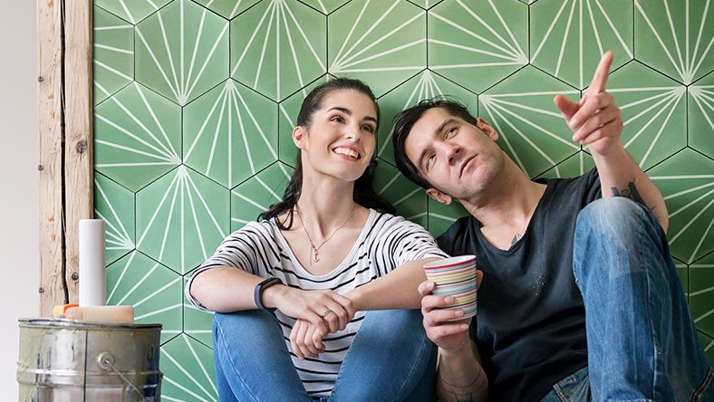 Couple admiring interior of their property investment