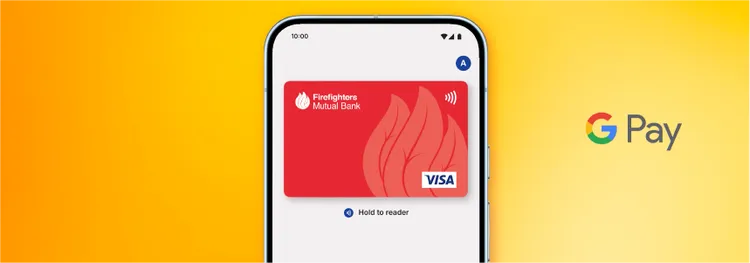 A smartphone screen shows a digital red Visa credit card from Firefighters Mutual Bank inside a mobile wallet.